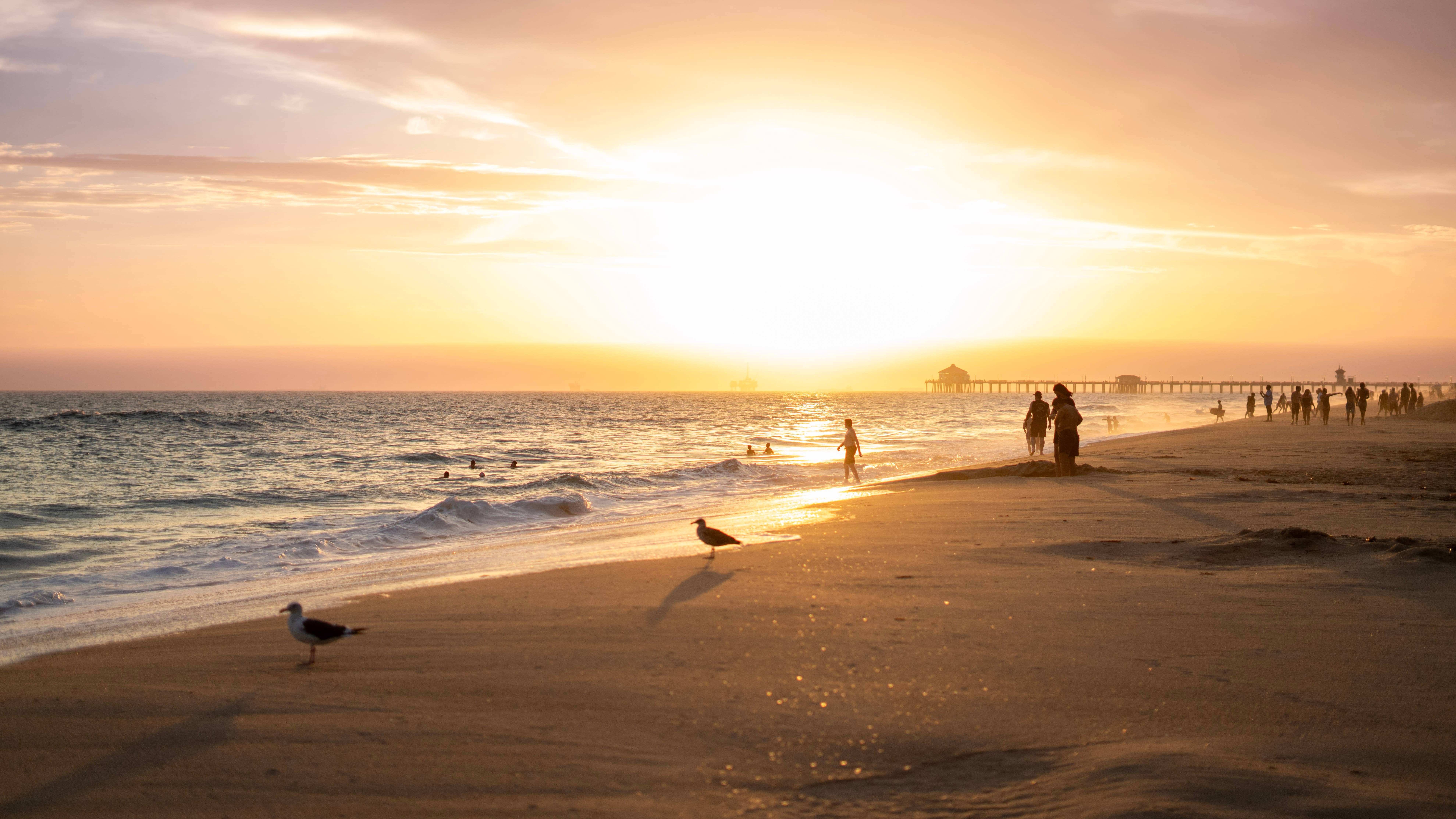 Stunning sunset with a picturesque sky over Huntington Beach, California